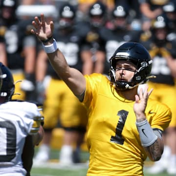 Iowa quarterback Brendan Sullivan (1) throws the ball during Kids Day at Kinnick Saturday, Aug. 10, 2024 at Kinnick Stadium in Iowa City, Iowa.