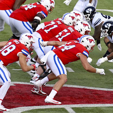 Sep 6, 2024; Dallas, Texas, USA; A view of the Southern Methodist Mustangs and Brigham Young Cougars as they face off on the line during the first half at Gerald J. Ford Stadium.