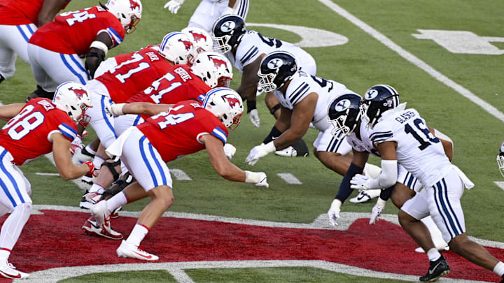 Sep 6, 2024; Dallas, Texas, USA; A view of the Southern Methodist Mustangs and Brigham Young Cougars as they face off on the line during the first half at Gerald J. Ford Stadium.