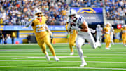 Oct 19, 2025; Inglewood, California, USA; Indianapolis Colts wide receiver Alec Pierce (14) catches the ball in the first half against the Los Angeles Chargers at SoFi Stadium. Mandatory Credit: Gary A. Vasquez-Imagn Images