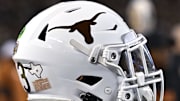 Nov 30, 2024; College Station, Texas, USA; A detail view of a Texas Longhorns helmet on the sideline during the first quarter against the Texas A&M Aggies. The Longhorns defeated the Aggies 17-7 at Kyle Field. Mandatory Credit: Maria Lysaker-Imagn Images  