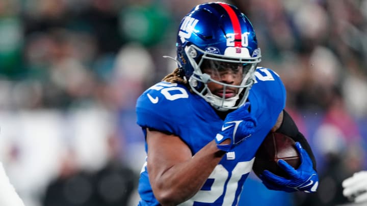 New York Giants running back Eric Gray (20) runs with the ball in the fourth quarter, Sunday, January 7, 2024.