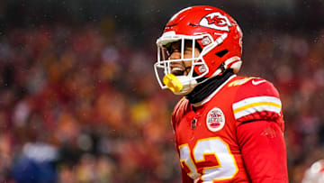 Jan 21, 2023; Kansas City, Missouri, USA; Kansas City Chiefs safety Juan Thornhill (22) celebrates during the second half of an AFC divisional round game against the Jacksonville Jaguars at GEHA Field at Arrowhead Stadium. Mandatory Credit: Jay Biggerstaff-Imagn Images