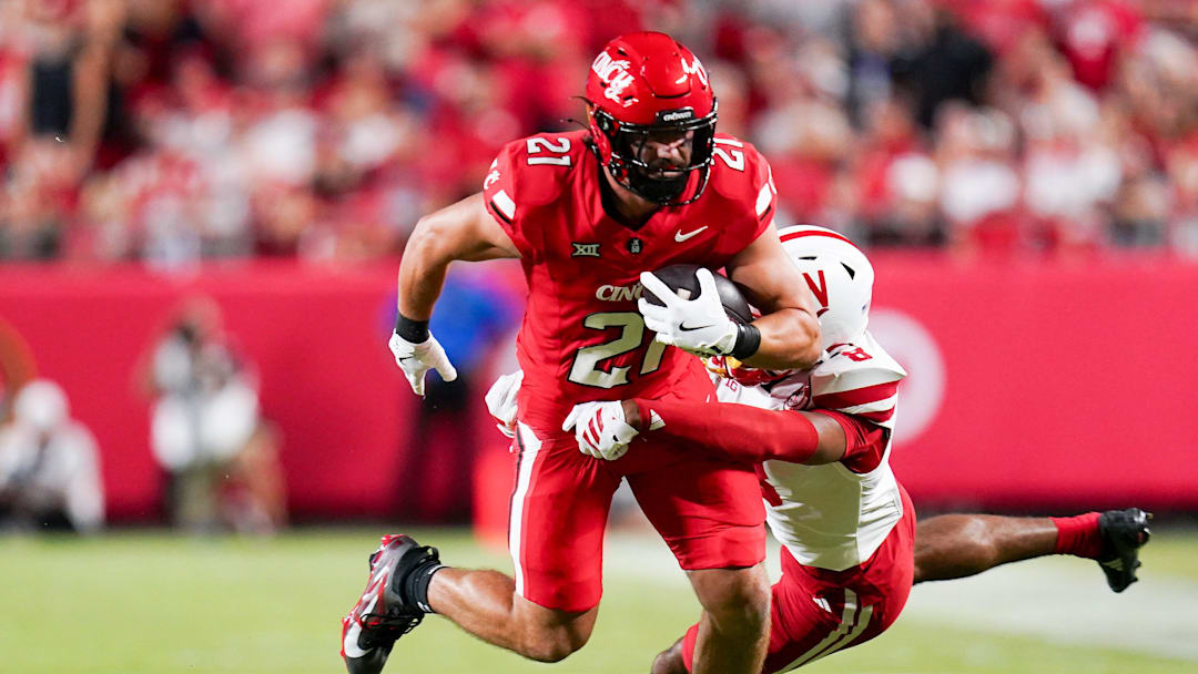 Nebraska Cornhuskers defensive back DeShon Singleton (8) tackles Cincinnati Bearcats tight end Patrick Gurd (21) in the first quarter of the Kansas City Classic season opening game between the Cincinnati Bearcats and Nebraska Cornhuskers, Thursday, Aug. 28, 2025, at Arrowhead Stadium in Kansas City, Mo. Cornhuskers are up 13-3 at halftime.