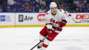 Sep 29, 2023; Tampa, Florida, USA;  Carolina Hurricanes right wing Jesper Fast (71) controls the puck against the Tampa Bay Lightning in the first period during preseason at Amalie Arena. Mandatory Credit: Nathan Ray Seebeck-USA TODAY Sports