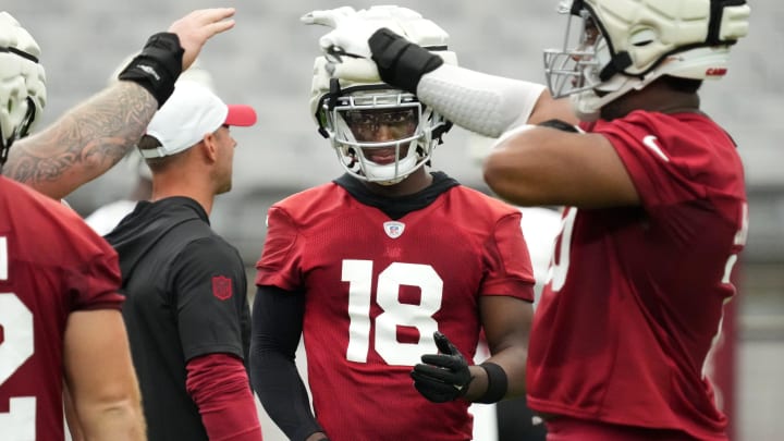 Arizona Cardinals receiver Marvin Harrison Jr. (18) enters the offensive huddle during training camp at State Farm Stadium in Glendale on July 25, 2024.