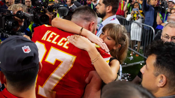 Feb 11, 2024; Paradise, Nevada, USA; Kansas City Chiefs tight end Travis Kelce (87) celebrates with girlfriend Taylor Swift after defeating the San Francisco 49ers in Super Bowl LVIII at Allegiant Stadium. Mandatory Credit: Mark J. Rebilas-USA TODAY Sports