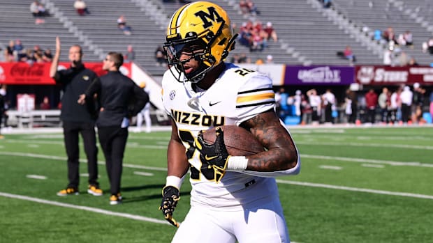 Missouri Tigers running back Jamal Roberts (20) warms up before a game against the Massachusetts Minutemen at Warren McGuirk 