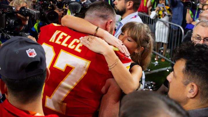 Feb 11, 2024; Paradise, Nevada, USA; Kansas City Chiefs tight end Travis Kelce (87) celebrates with girlfriend Taylor Swift after defeating the San Francisco 49ers in Super Bowl LVIII at Allegiant Stadium. Mandatory Credit: Mark J. Rebilas-USA TODAY Sports