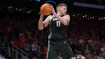 Mar 30, 2025; Atlanta, GA, USA; Michigan State Spartans forward Jaxon Kohler (0) rebounds during the first half in the South Regional final of the 2025 NCAA tournament against the Auburn Tigers at State Farm Arena. Mandatory Credit: Brett Davis-Imagn Images