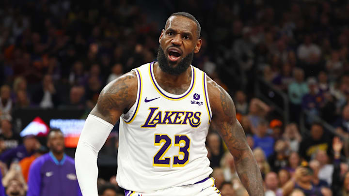 Feb 25, 2024; Phoenix, Arizona, USA; Los Angeles Lakers forward LeBron James (23) reacts as he celebrates a slam dunk against the Phoenix Suns at Footprint Center. Mandatory Credit: Mark J. Rebilas-Imagn Images