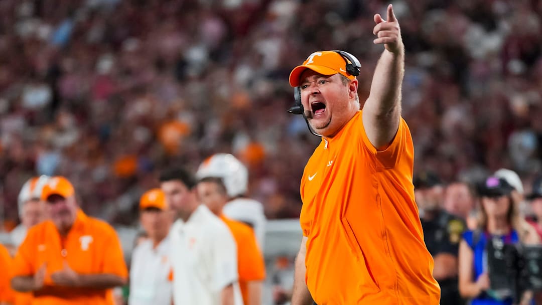 Tennessee coach Josh Heupel points to the running clock while yelling at the referees for a timeout during a college football game between Tennessee and Alabama at Bryant-Denny Stadium in Tuscaloosa, Ala., on Oct. 18, 2025.