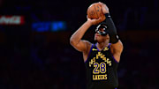 Dec 5, 2023; Los Angeles, California, USA; Los Angeles Lakers forward Rui Hachimura (28) shoots against the Phoenix Suns during the first half of the In Season Tournament quarterfinal at Crypto.com Arena. Mandatory Credit: Gary A. Vasquez-Imagn Images