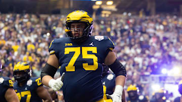 Dec 31, 2022; Glendale, Arizona, USA; Michigan Wolverines offensive lineman Andrew Gentry (75) against the TCU Horned Frogs during the 2022 Fiesta Bowl at State Farm Stadium. Mandatory Credit: Mark J. Rebilas-Imagn Images
