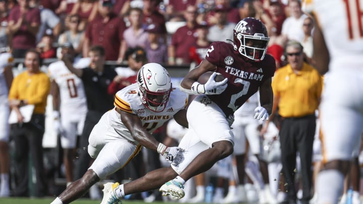 Sep 16, 2023; College Station, Texas, USA; Louisiana Monroe Warhawks linebacker Travor Randle (4) attempts to tackle Texas A&M Aggies running back Rueben Owens (2) on a play during the second quarter at Kyle Field. Mandatory Credit: Troy Taormina-USA TODAY Sports