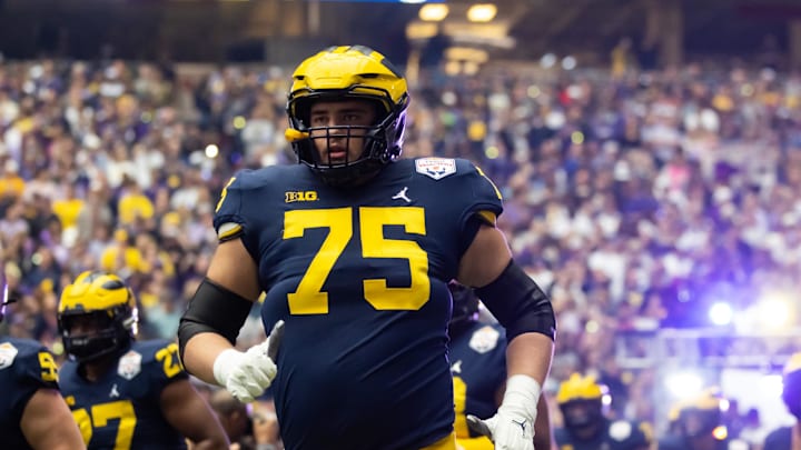 Dec 31, 2022; Glendale, Arizona, USA; Michigan Wolverines offensive lineman Andrew Gentry (75) against the TCU Horned Frogs during the 2022 Fiesta Bowl at State Farm Stadium. Mandatory Credit: Mark J. Rebilas-Imagn Images