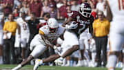 Louisiana Monroe Warhawks linebacker Travor Randle (4) attempts to tackle Texas A&M Aggies running back Rueben Owens (2) on a play during the second quarter at Kyle Field.