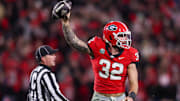 Nov 29, 2024; Athens, Georgia, USA; Georgia Bulldogs linebacker Chaz Chambliss (32) reacts after recovering a fumble against the Georgia Tech Yellow Jackets in the fourth quarter at Sanford Stadium.