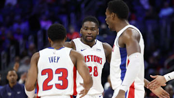 Mar 7, 2024; Detroit, Michigan, USA;  Detroit Pistons guard Jaden Ivey (23) center Isaiah Stewart (28) and center Jalen Duren (0) celebrates in the second half against the Brooklyn Nets at Little Caesars Arena. Mandatory Credit: Rick Osentoski-USA TODAY Sports