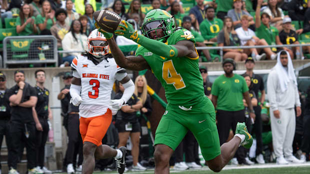 oregon ducks dakorien moore malik benson wide receiver big ten nil transfer portal recruiting dante moore dan lanning 