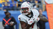 Oct 25, 2025; Pittsburgh, Pennsylvania, USA; North Carolina State Wolfpack tight end Justin Joly (7) catches the ball for a touchdown against the Pittsburgh Panthers during the first quarter at Acrisure Stadium. Mandatory Credit: Charles LeClaire-Imagn Images