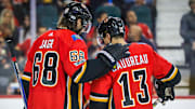 Oct 13, 2017; Calgary, Alberta, CAN; Calgary Flames right wing Jaromir Jagr (68) and left wing Johnny Gaudreau (13) during the second period against the Ottawa Senators at Scotiabank Saddledome. Mandatory Credit: Sergei Belski-USA TODAY Sports