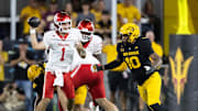 Oct 25, 2025; Tempe, Arizona, USA; Houston Cougars quarterback Conner Weigman (1) against Arizona State Sun Devils defensive lineman Clayton Smith (10) in the first half at Mountain America Stadium. Mandatory Credit: Mark J. Rebilas-Imagn Images
