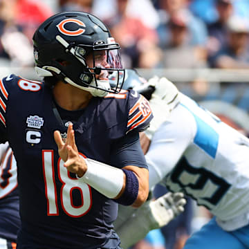 Sep 8, 2024; Chicago, Illinois, USA; Chicago Bears quarterback Caleb Williams (18) drops back to pass during the second half against the Tennessee Titans at Soldier Field.