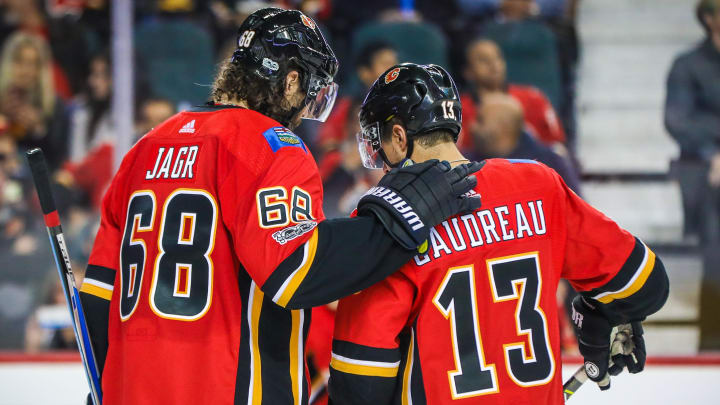 Oct 13, 2017; Calgary, Alberta, CAN; Calgary Flames right wing Jaromir Jagr (68) and left wing Johnny Gaudreau (13) during the second period against the Ottawa Senators at Scotiabank Saddledome. Mandatory Credit: Sergei Belski-USA TODAY Sports