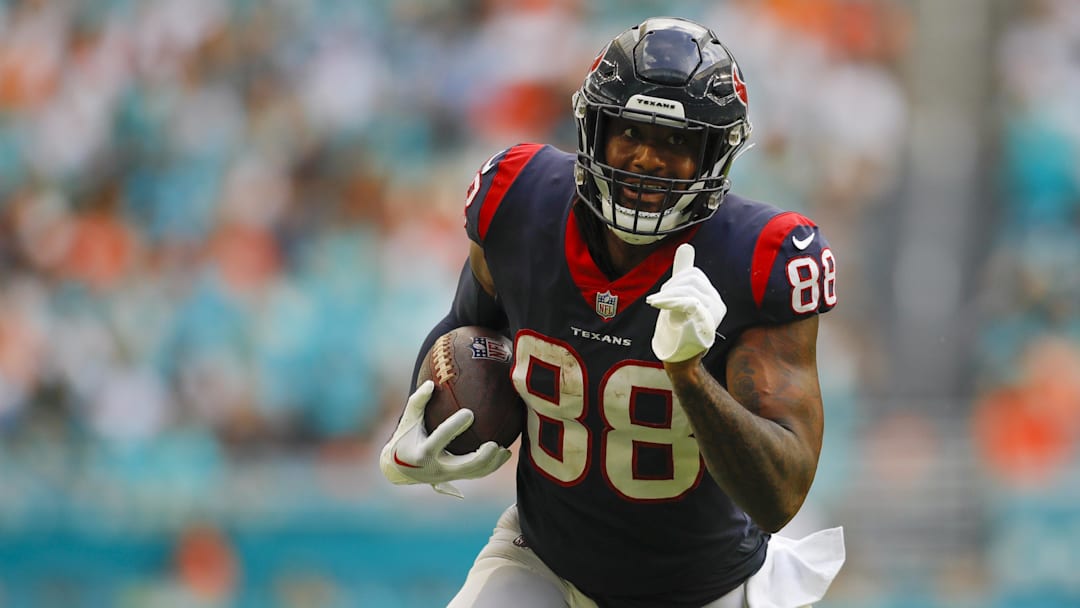 Nov 27, 2022; Miami Gardens, Florida, USA; Houston Texans tight end Jordan Akins (88) runs with the football during the third quarter against the Miami Dolphins at Hard Rock Stadium.