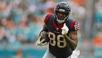 Nov 27, 2022; Miami Gardens, Florida, USA; Houston Texans tight end Jordan Akins (88) runs with the football during the third quarter against the Miami Dolphins at Hard Rock Stadium.