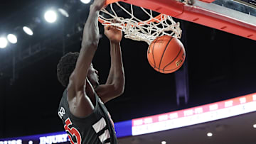Mar 1, 2025; Houston, Texas, USA;Cincinnati Bearcats forward Aziz Bandaogo (55) dunks against the Houston Cougars in the second half at Fertitta Center. Mandatory Credit: Thomas Shea-Imagn Images