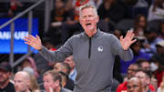 Mar 22, 2025; Atlanta, Georgia, USA: Golden State Warriors head coach Steve Kerr shows emotion against the Atlanta Hawks in the first quarter at State Farm Arena. Mandatory Credit: Brett Davis-Imagn Images