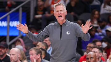 Mar 22, 2025; Atlanta, Georgia, USA: Golden State Warriors head coach Steve Kerr shows emotion against the Atlanta Hawks in the first quarter at State Farm Arena. Mandatory Credit: Brett Davis-Imagn Images
