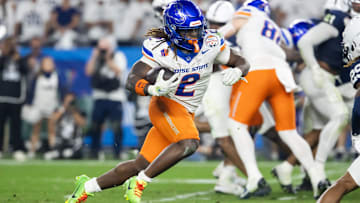 Dec 31, 2024; Glendale, AZ, USA; Boise State Broncos running back Ashton Jeanty (2) against the Penn State Nittany Lions during the Fiesta Bowl at State Farm Stadium. Mandatory Credit: Mark J. Rebilas-Imagn Images