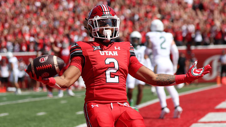 Sep 7, 2024; Salt Lake City, Utah, USA; Utah Utes running back Micah Bernard (2) celebrates a touchdown against the Baylor Bears during the first quarter at Rice-Eccles Stadium. Mandatory Credit: Rob Gray-Imagn Images