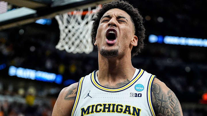 Michigan forward Yaxel Lendeborg (23) celebrates a dunk against Tennessee during the second half of NCAA Tournament Elite 8 round at United Center in Chicago on Sunday, March 29, 2026.