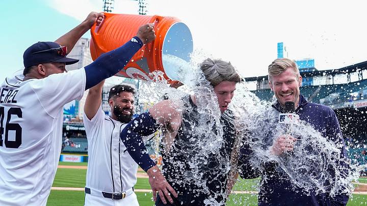 Detroit Tigers right fielder Wenceel Pérez (46), left, and second baseman Gleyber Torres (25) give a Gatorade bath to second baseman Colt Keith (33) to celebrate his walk-off single against Kansas City Royals to win the game 10-9 at Comerica Park in Detroit on Thursday, April 16, 2026.