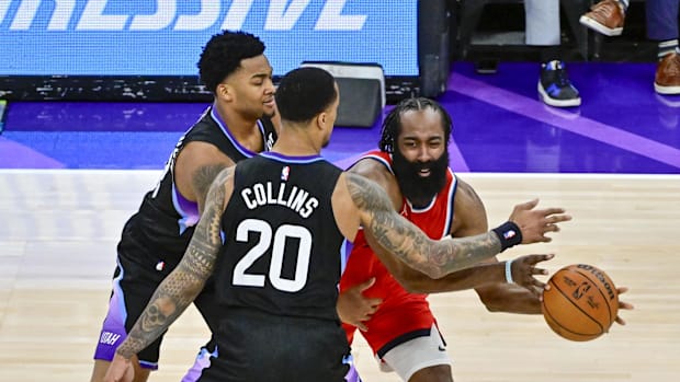 Utah Jazz forward/center John Collins (20) and guard Keyonte George (3) pressure LA Clippers guard James Harden