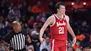 Dec 13, 2025; Champaign, Illinois, USA; Nebraska Cornhuskers forward Pryce Sandfort (21) reacts after hitting a three-point shot during the first half against the Illinois Fighting Illini at State Farm Center.