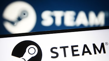 In this photo illustration a Steam logo of a video game...