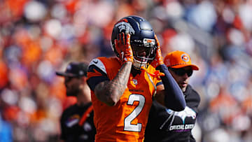 Oct 13, 2024; Denver, Colorado, USA; Denver Broncos cornerback Pat Surtain II (2) leaves the field in the first quarter against the Los Angeles Chargers at Empower Field at Mile High. Mandatory Credit: Ron Chenoy-Imagn Images