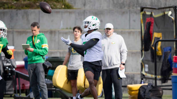 Oregon wide receiver Evan Stewart hauls in a pass during practice with the Ducks Thursday, April 11, 2024, at the Hatfield-Do