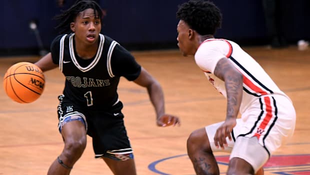 Evans guard Antonio Pollard dibbles against the Williston defense at the Kingdom of the Sun. 