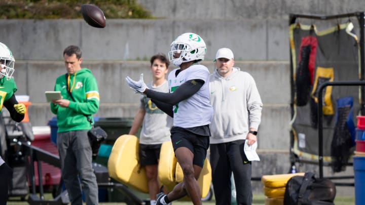 Oregon wide receiver Evan Stewart hauls in a pass during practice with the Ducks Thursday, April 11, 2024, at the Hatfield-Dowlin Complex in Eugene, Ore.