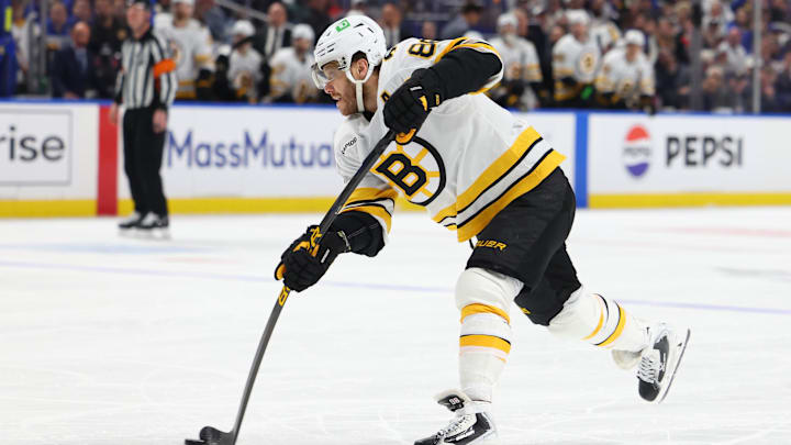 Apr 28, 2026; Buffalo, New York, USA; Boston Bruins right wing David Pastrnak (88) takes a shot on goal during the first period against the Buffalo Sabres in game five of the first round of the 2026 Stanley Cup Playoffs at KeyBank Center. Mandatory Credit: Timothy T. Ludwig-Imagn Images