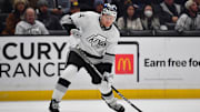 Feb 24, 2024; Los Angeles, California, USA; Los Angeles Kings right wing Arthur Kaliyev (34) shoots on goal against the Anaheim Ducks during the second period at Crypto.com Arena. Mandatory Credit: Gary A. Vasquez-Imagn Images