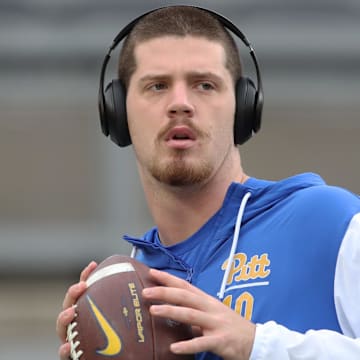 Nov 16, 2024; Pittsburgh, Pennsylvania, USA;  Pittsburgh Panthers quarterback Eli Holstein (10) warms up before the game against the Clemson Tigers at Acrisure Stadium. Mandatory Credit: Charles LeClaire-Imagn Images