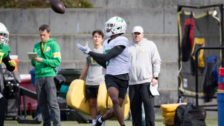 Oregon wide receiver Evan Stewart hauls in a pass during practice with the Ducks Thursday, April 11, 2024, at the Hatfield-Dowlin Complex in Eugene, Ore.