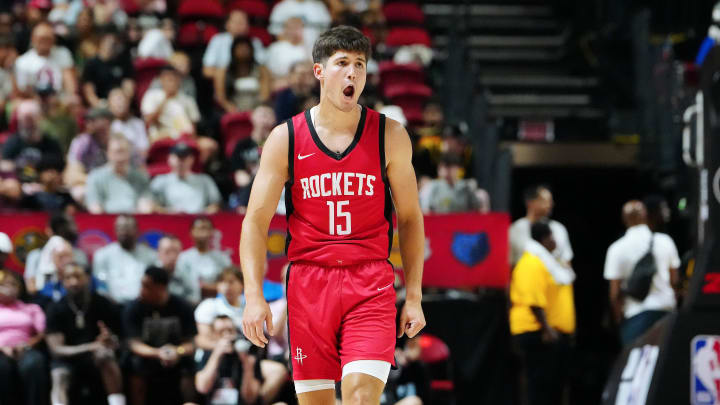 Jul 14, 2024; Las Vegas, NV, USA; Houston Rockets guard Reed Sheppard (15) reacts after scoring against the Washington Wizards during the third quarter at Thomas & Mack Center. Mandatory Credit: Stephen R. Sylvanie-USA TODAY Sports